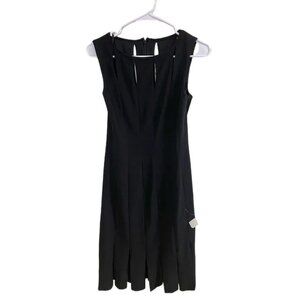 Frank‎ Lyman Design Black Dress Fabric Cutouts and bottom thick fringe Size S